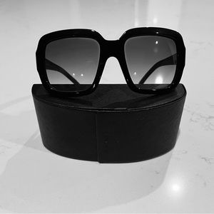Prada Sunglasses.